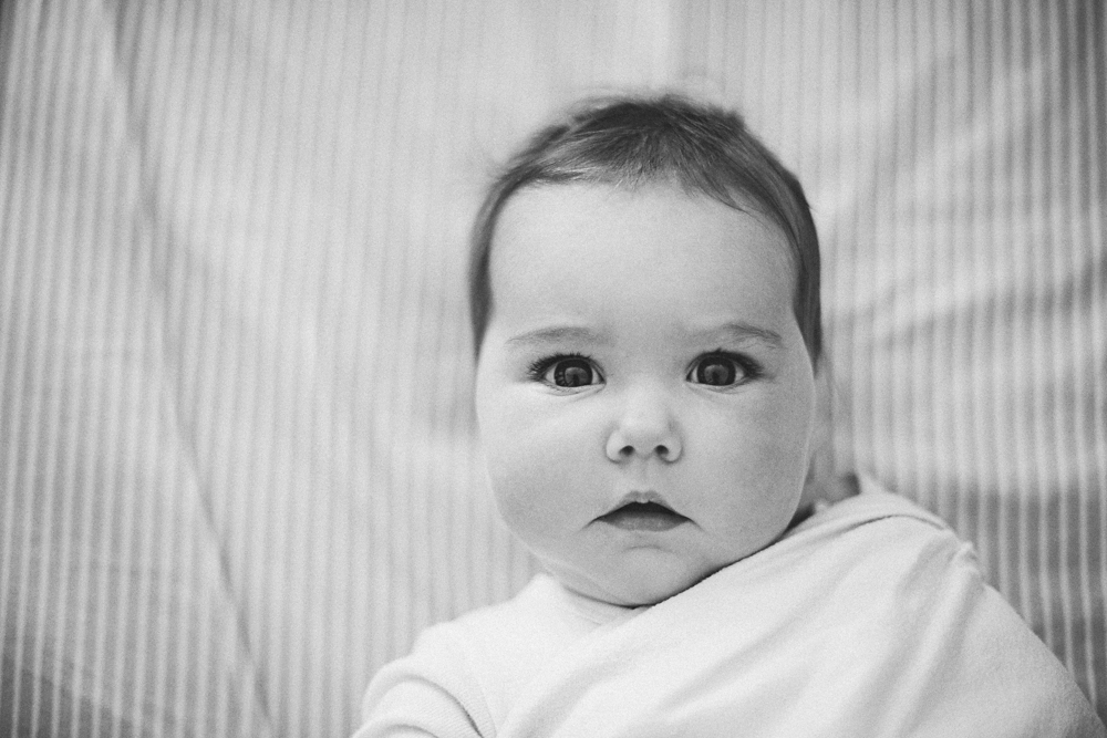 baby staring black and white