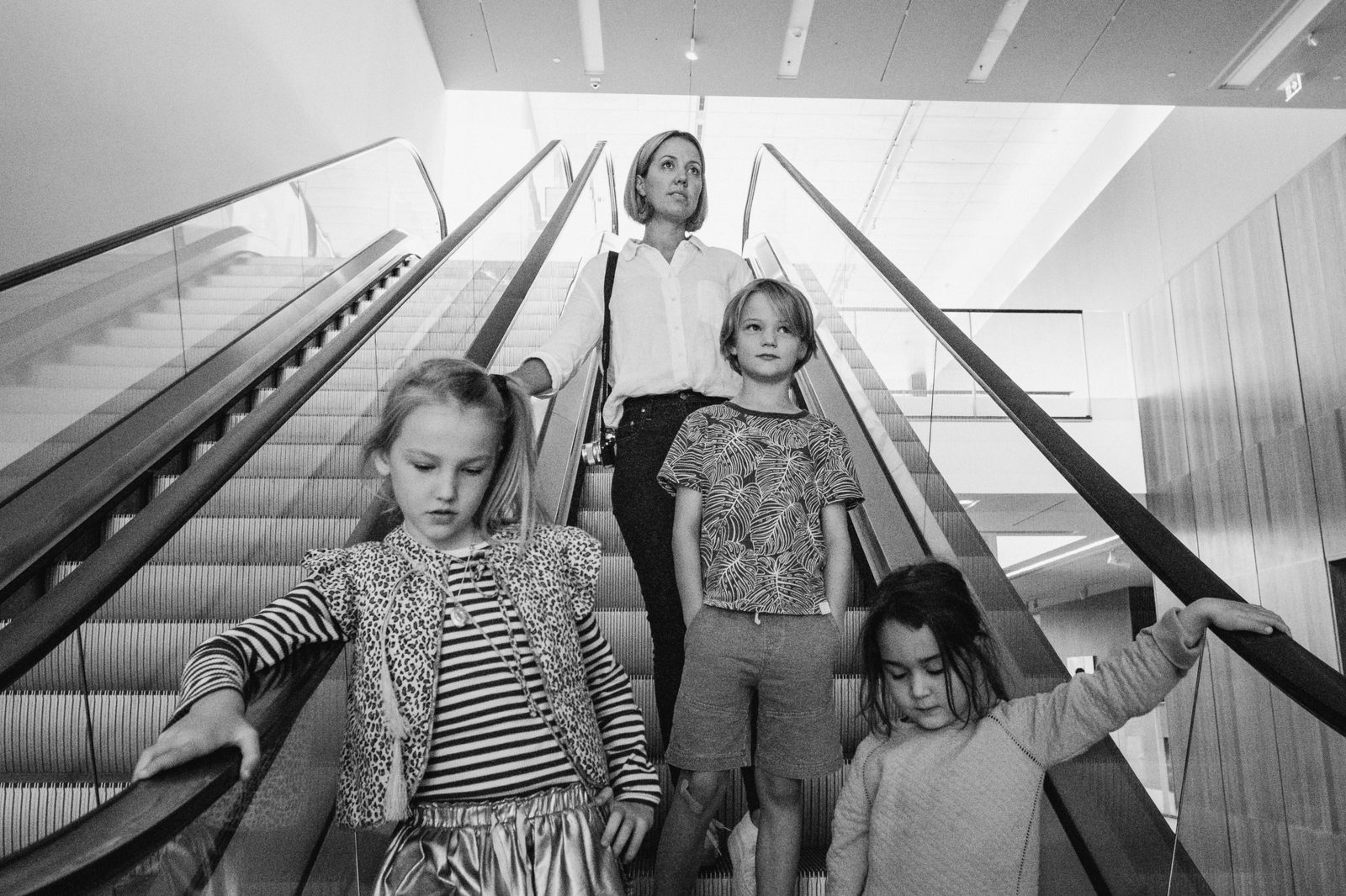 Family group on escalator